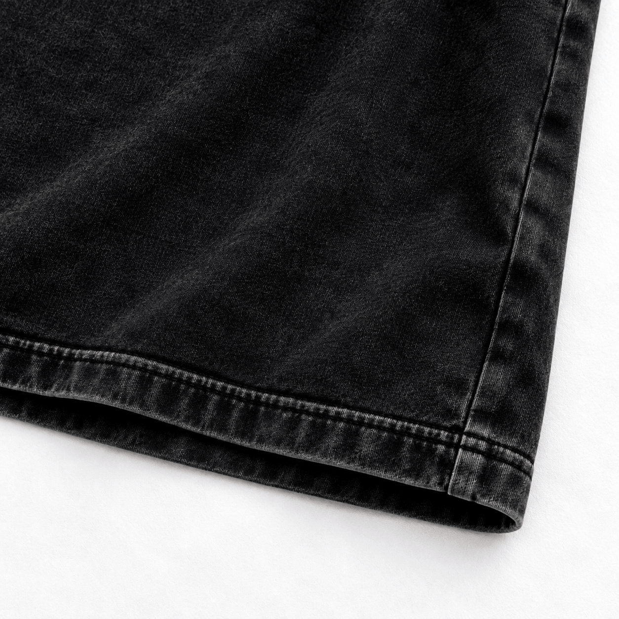 Vintage washed black T-shirt hem stitching detail