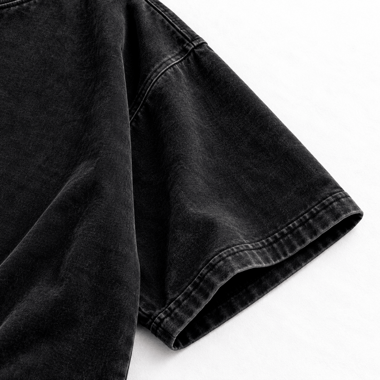 Vintage washed black T-shirt sleeve stitching detail